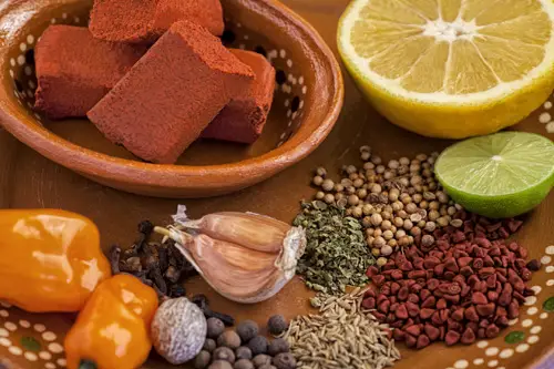 The Achiote Paste and some ingredients that are used in its preparation